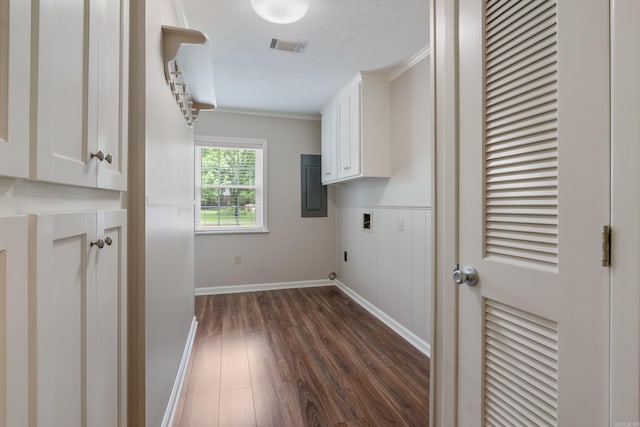 laundry area with cabinets, hookup for an electric dryer, washer hookup, ornamental molding, and dark hardwood / wood-style floors