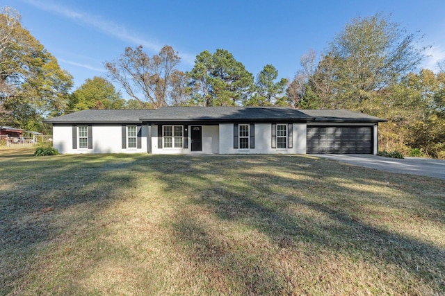 ranch-style home with a garage and a front yard