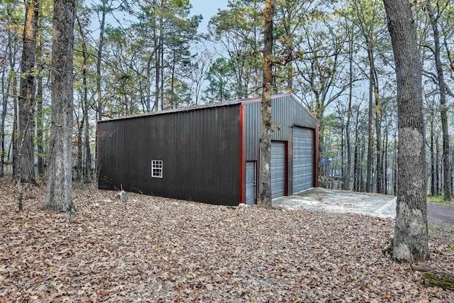 view of outdoor structure featuring a garage