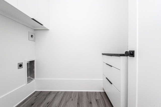 laundry room with dark hardwood / wood-style flooring, cabinets, and hookup for an electric dryer