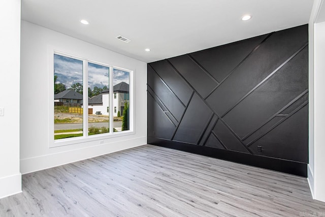 empty room featuring light hardwood / wood-style floors