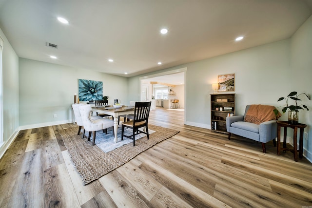 dining room featuring light hardwood / wood-style floors