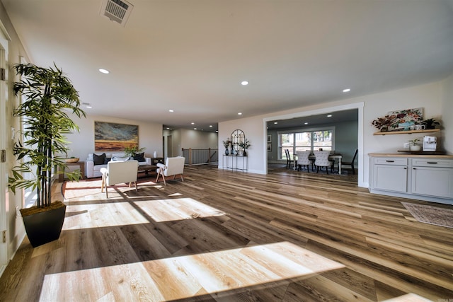 unfurnished living room with light hardwood / wood-style floors