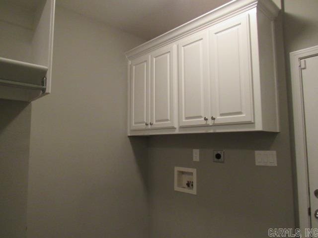 laundry area with cabinets, washer hookup, and hookup for an electric dryer