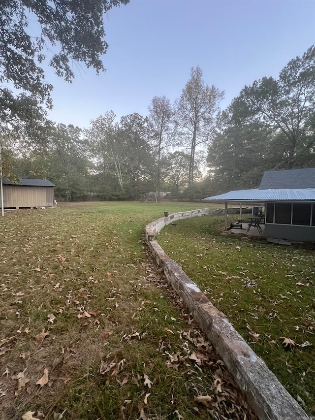 view of yard with a sunroom