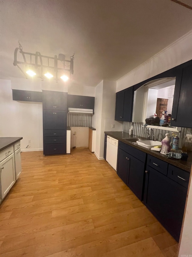 kitchen featuring white cabinetry, dishwasher, sink, and light wood-type flooring