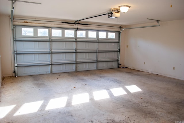 garage featuring a garage door opener