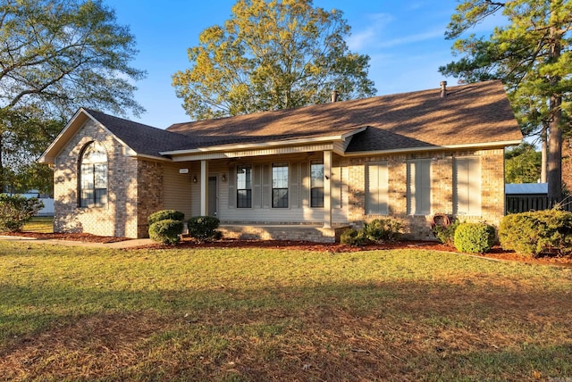 view of front facade with a front lawn