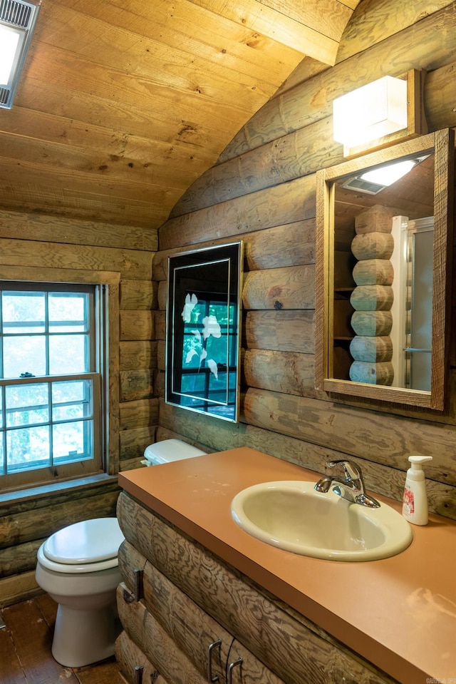 bathroom with rustic walls, wooden ceiling, vaulted ceiling, toilet, and hardwood / wood-style flooring