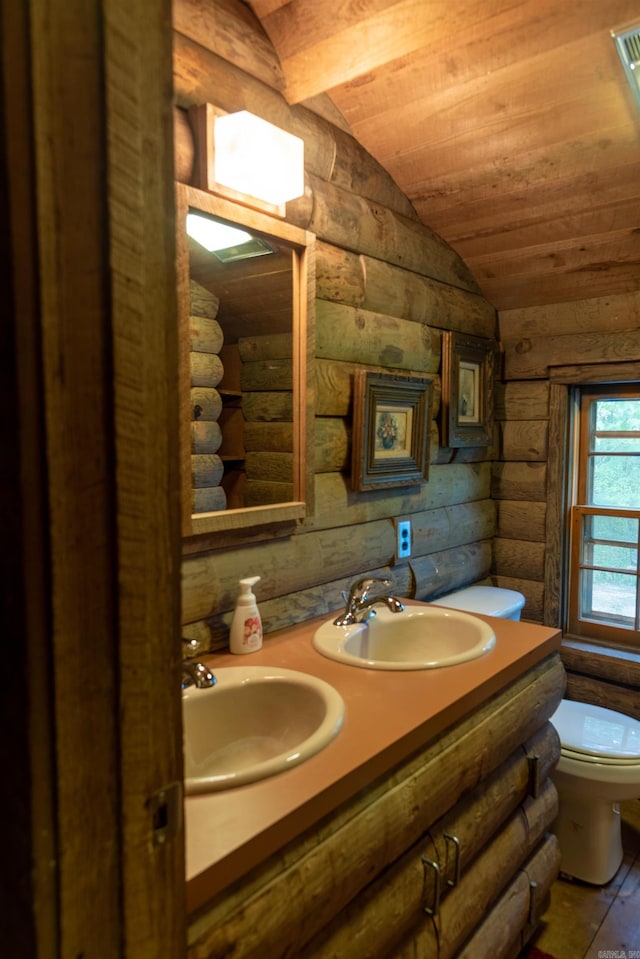 bathroom with wooden ceiling, vaulted ceiling, hardwood / wood-style flooring, toilet, and rustic walls