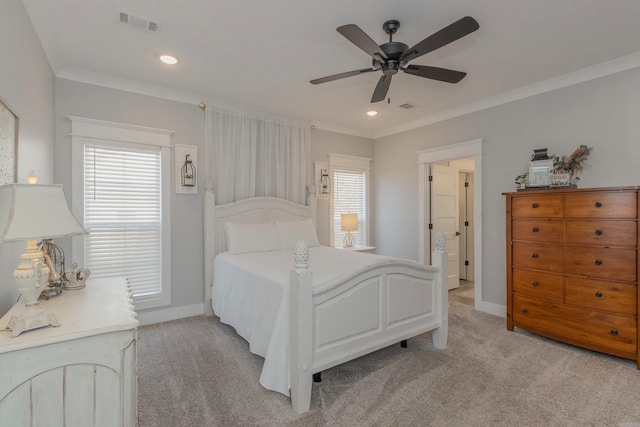 bedroom featuring light carpet, multiple windows, ornamental molding, and ceiling fan