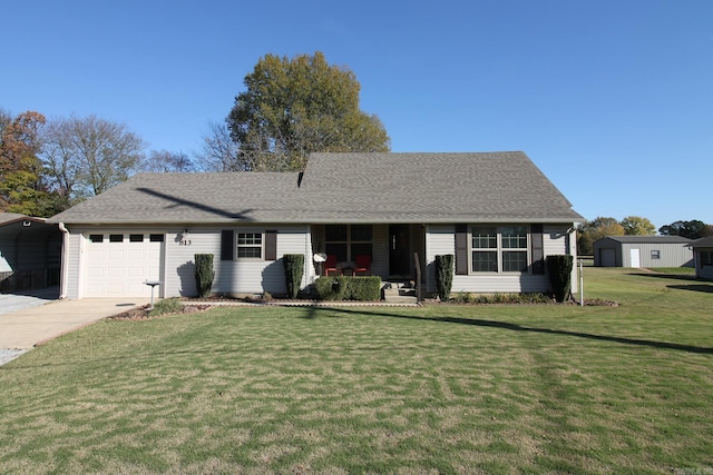 single story home with a garage and a front lawn