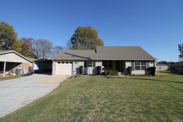 ranch-style home featuring a front lawn, a garage, and a carport