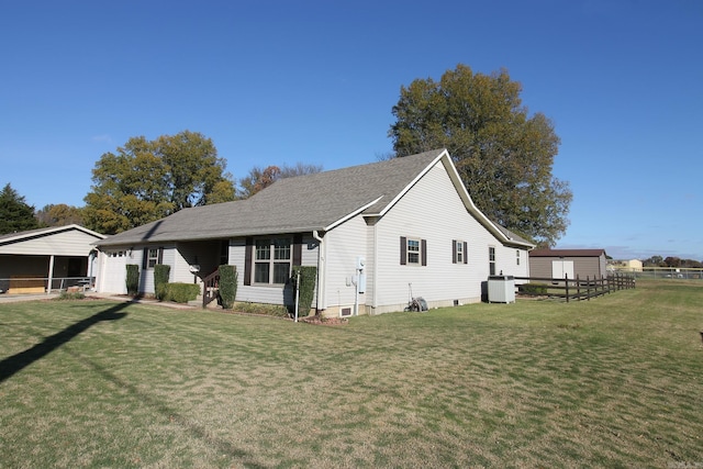 view of property exterior featuring a garage and a yard