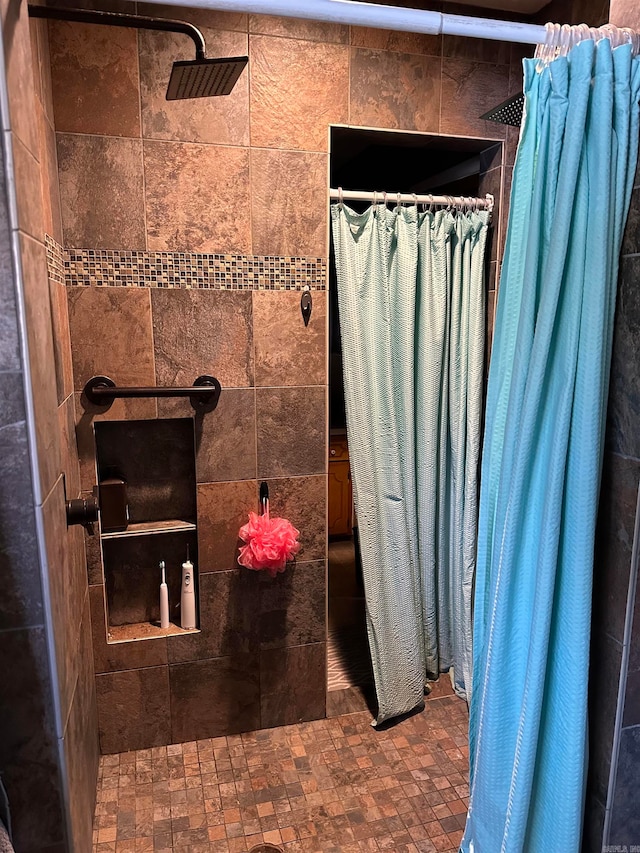 bathroom featuring a shower with curtain