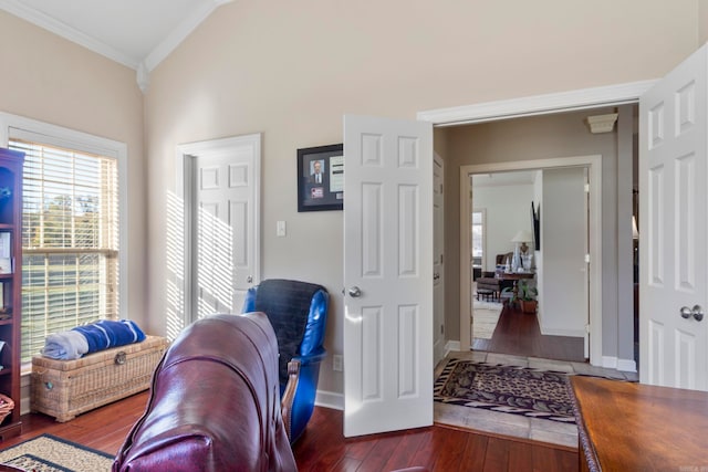 office area with crown molding, hardwood / wood-style floors, and lofted ceiling