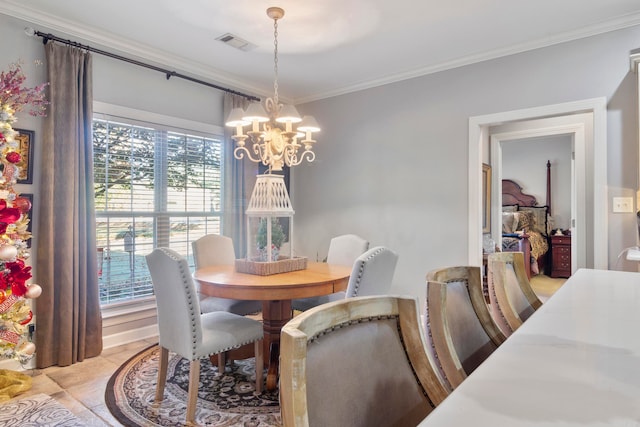 tiled dining room featuring crown molding and an inviting chandelier