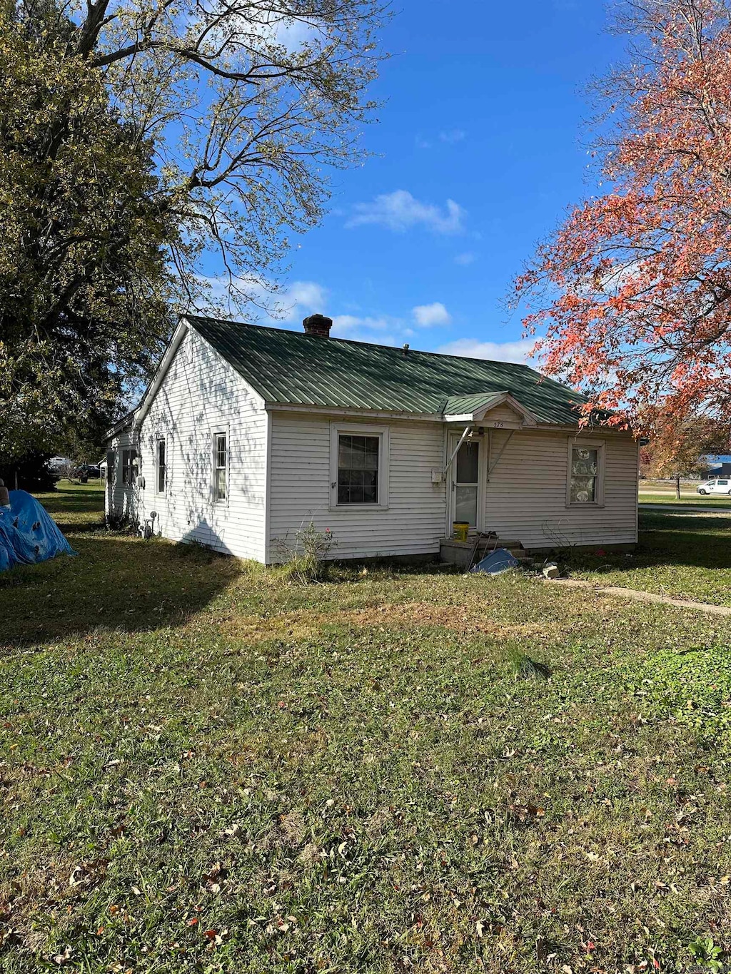 exterior space with a front lawn