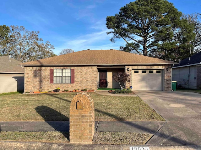 ranch-style house with a garage and a front yard