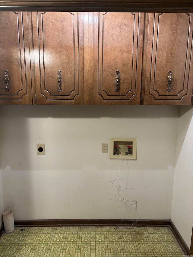 laundry room featuring hookup for an electric dryer, cabinets, and hookup for a washing machine