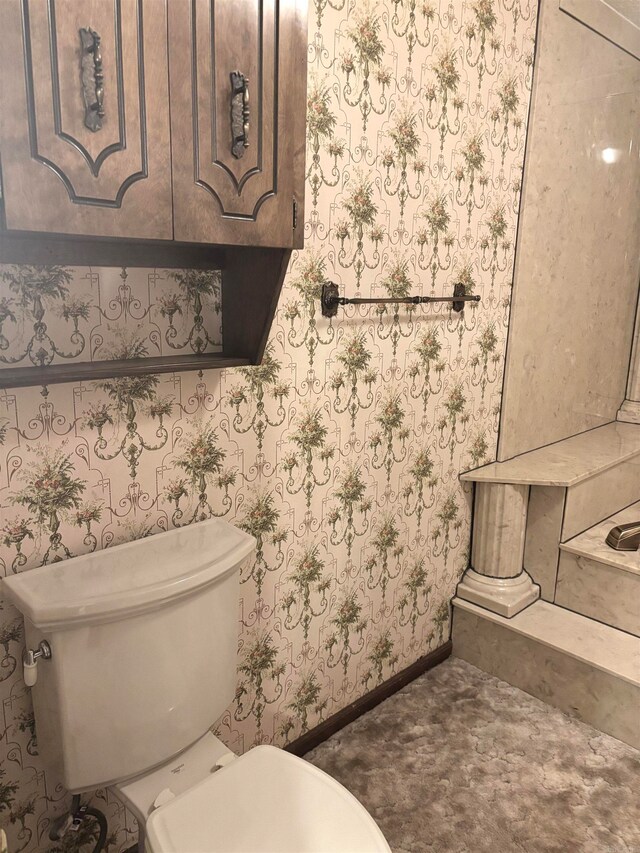 bathroom featuring toilet