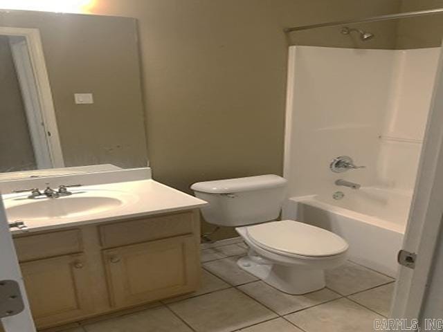 full bathroom with tile patterned flooring, vanity,  shower combination, and toilet