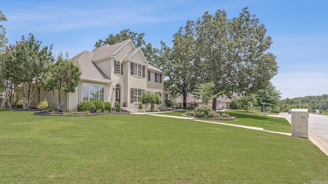 view of front of house with a front lawn