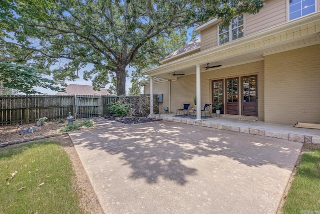 view of patio featuring ceiling fan