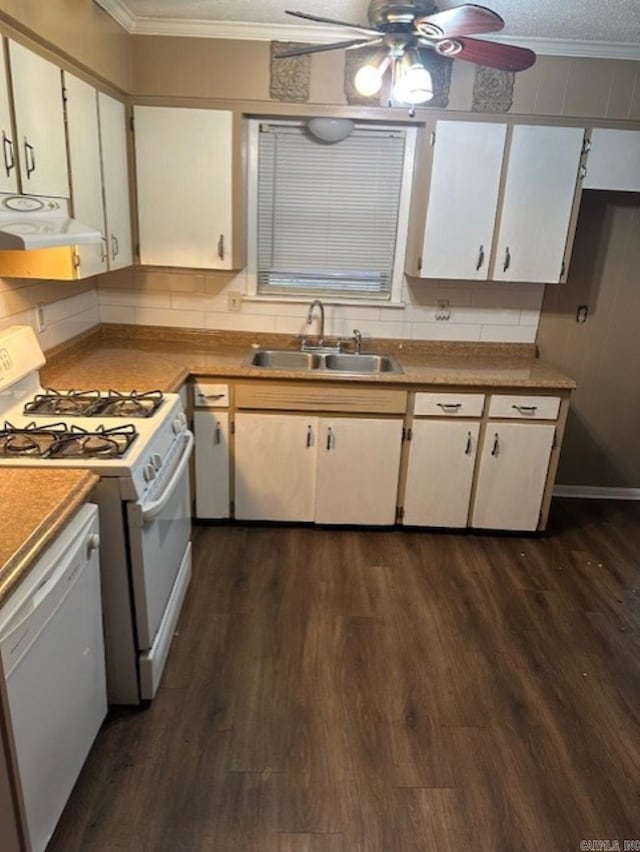 kitchen with white cabinetry, sink, dark wood-type flooring, range hood, and white appliances