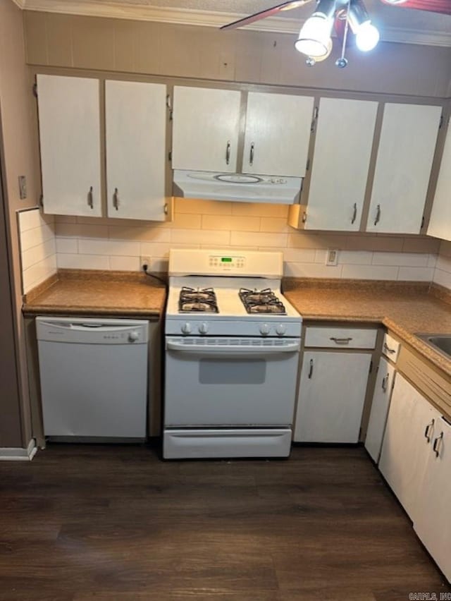 kitchen with tasteful backsplash, white cabinetry, dark wood-type flooring, and white appliances