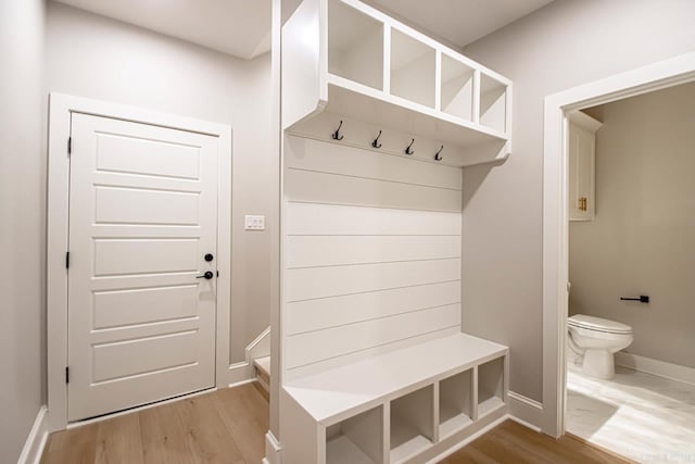 mudroom with hardwood / wood-style floors