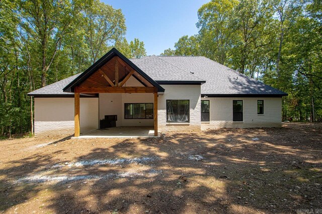 rear view of house with a patio area