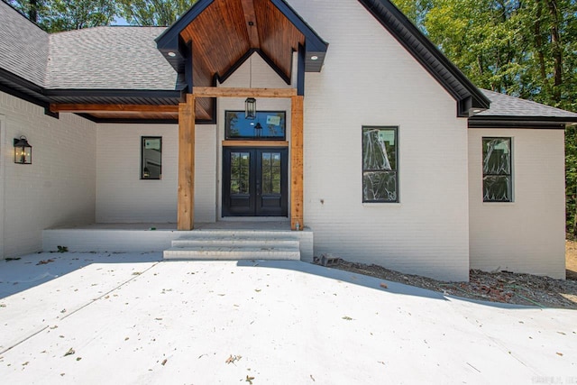 entrance to property featuring french doors