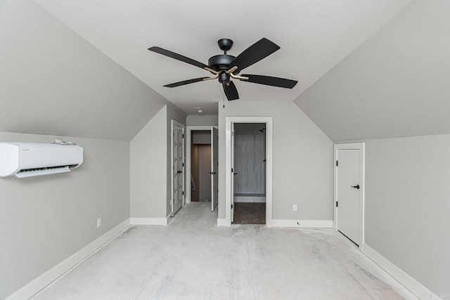 bonus room with a wall mounted AC, ceiling fan, and vaulted ceiling