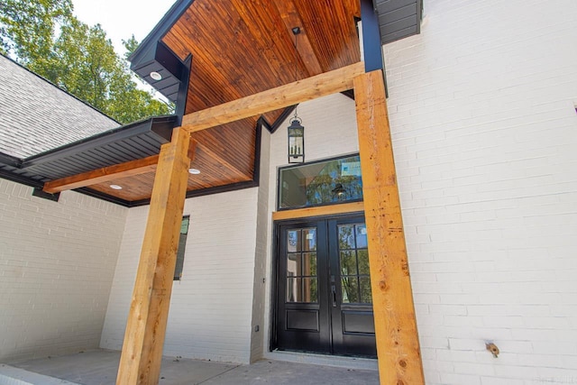 entrance to property featuring french doors