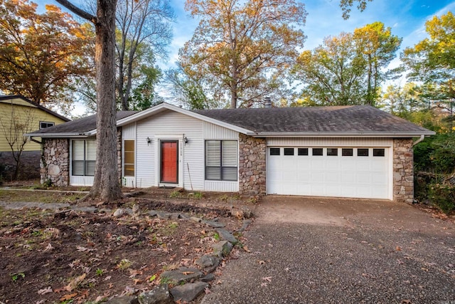 single story home featuring a garage