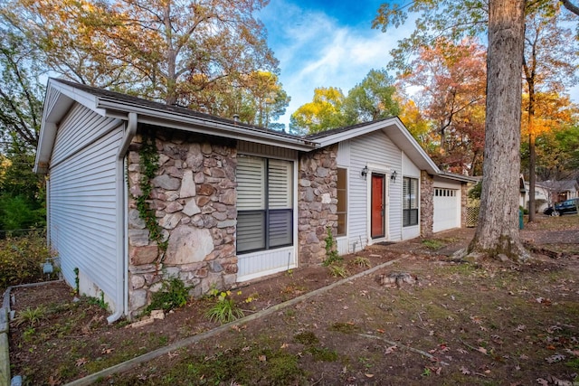 view of home's exterior featuring a garage