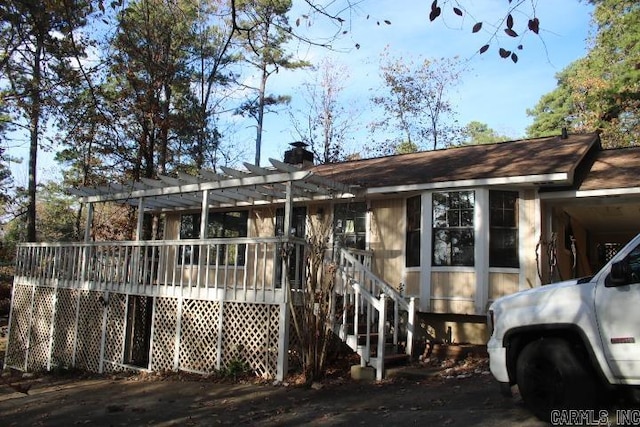 view of front of house featuring a pergola