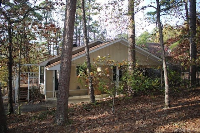 view of property exterior featuring a patio area