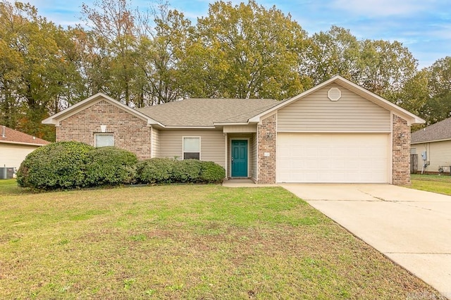 ranch-style house with cooling unit, a garage, and a front yard