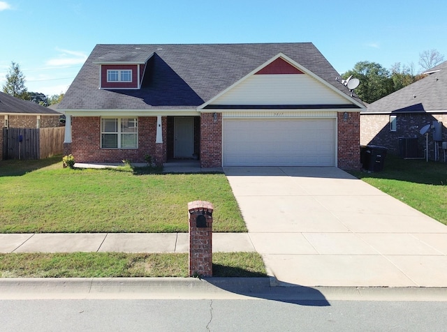 view of front facade with a front lawn and a garage