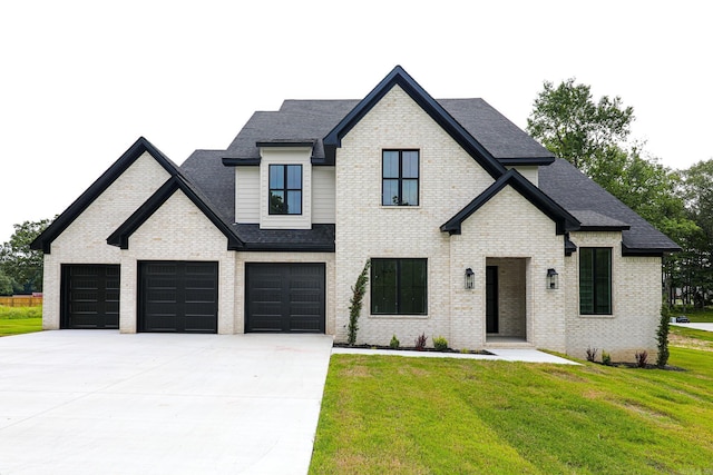 french country style house featuring a front yard