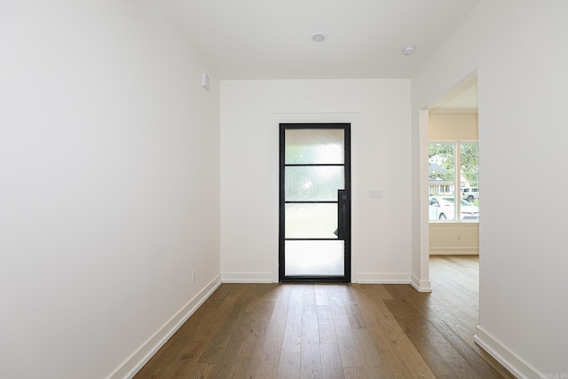 interior space with hardwood / wood-style floors