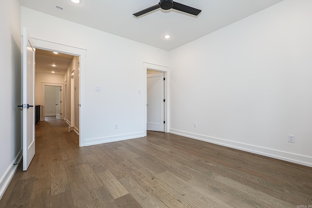 unfurnished bedroom with hardwood / wood-style floors and ceiling fan