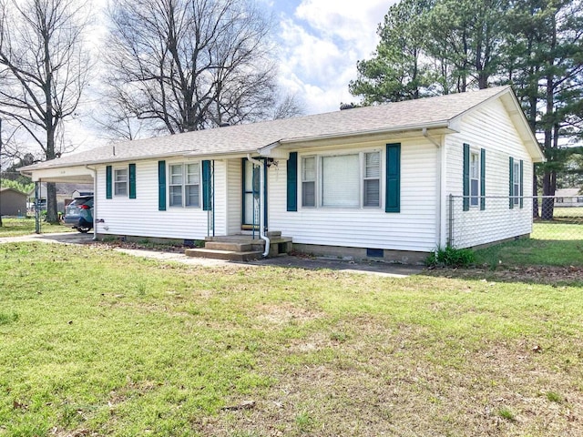 single story home featuring a front yard and a carport