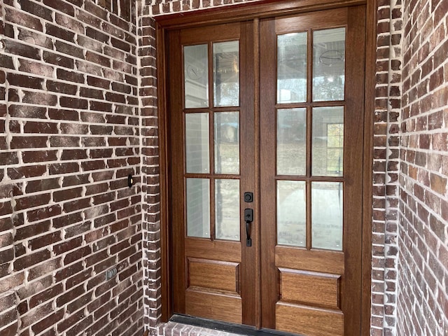 62 Highland Cove Dr, Highland, AR 72542 - property entrance with french doors and brick siding