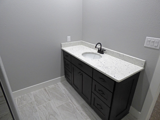 62 Highland Cove Dr, Highland, AR 72542 - bathroom with vanity and baseboards