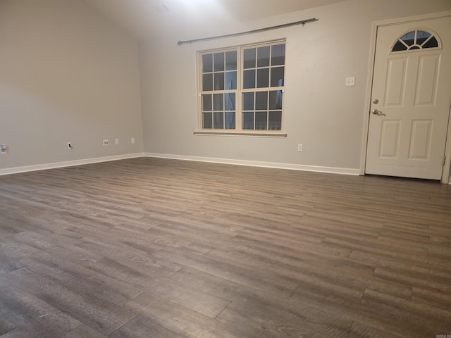 unfurnished room featuring dark hardwood / wood-style flooring