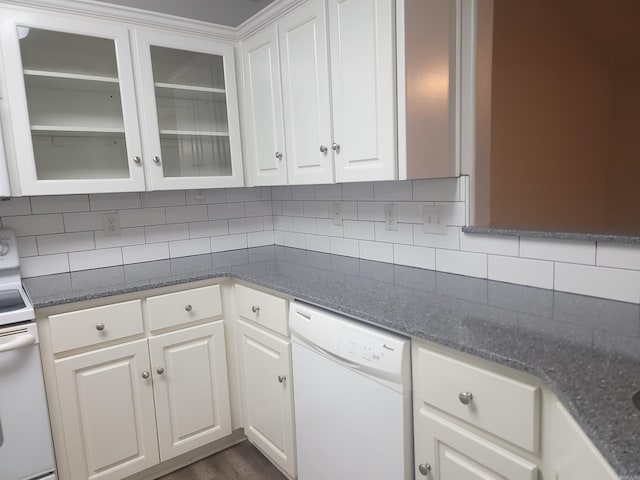 kitchen featuring decorative backsplash, white cabinetry, and white appliances