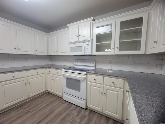 kitchen featuring backsplash, white cabinetry, dark hardwood / wood-style flooring, and white appliances